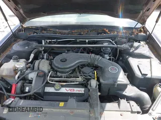 1995 Cadillac DeVille z VIN 1G6KD52B0SU272958, wystawiony jako IAAI lot #42514096 z przebiegiem 89 030 mil mil oraz . Historia ofert i sprzedaży dostępna na DreamBid. Obrazek 10.