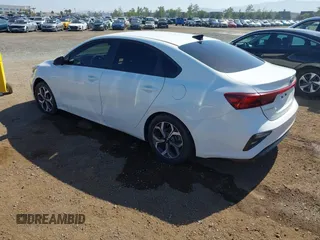 2021 Kia Forte LXS with VIN 3KPF24AD0ME322812, listed as a IAAI auction lot 42317017 with 86,216 mi miles and . Bid and sale history available at DreamBid. Image 3.