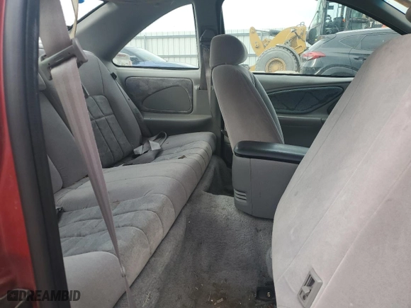 1996 Ford Thunderbird LX with VIN 1FALP62W7TH135632, listed as a Copart auction lot 77134024 with 128,931 mi miles and Salvage Title. Bid and sale history available at carsss.com. Image 10.