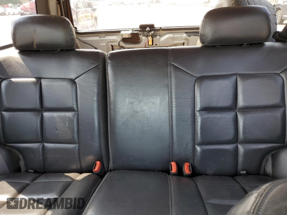 1998 Jeep Grand Cherokee Limited with VIN 1J4GZ78Y5WC324828, listed as a Copart auction lot 58992125 with 225,705 mi miles and Salvage title. Bid and sale history available at DreamBid. Image 10.