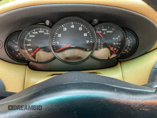 1999 Porsche 911 z VIN WP0AA2991XS620689, wystawiony jako Copart lot #59999925 z przebiegiem 152 508 mil mil oraz Czysty tytuł • Clean title. Historia ofert i sprzedaży dostępna na DreamBid. Obrazek 8.