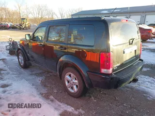 2007 Dodge Nitro SLT with VIN 1D8GU58K27W549214, listed as a IAAI auction lot 41358109 with 99,530 mi miles. Bid and sale history available at carsss.com. Image 3.