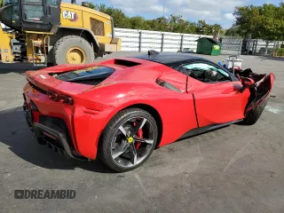 2023 Ferrari SF90 z VIN ZFF95NLAXP0291614, wystawiony jako Copart lot #83805524 z przebiegiem 719 mil mil oraz Szkody całkowita. Historia ofert i sprzedaży dostępna na DreamBid. Obrazek 3.