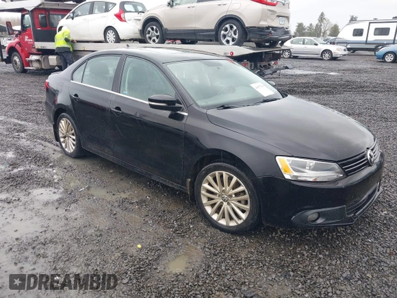 2014 Volkswagen Jetta TDI w/Premium with VIN 3VWLL7AJ1EM406360, listed as a IAAI auction lot 41857580 with 93,333 mi miles and . Bid and sale history available at DreamBid. Image 1.