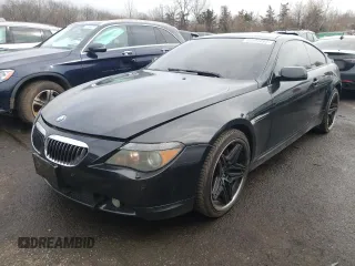 2006 BMW 6 Series 650Ci with VIN WBAEH13466CR50127, listed as a Copart auction lot 50591695 with 117,537 mi miles and Salvage Title. Bid and sale history available at carsss.com. Image 1.