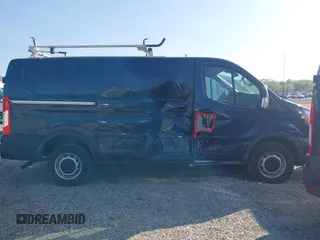 2023 Ford Transit Cargo with VIN 1FTBR1Y84PKB55342, listed as a IAAI auction lot 41511478 with 27,688 mi miles and . Bid and sale history available at DreamBid. Image 13.
