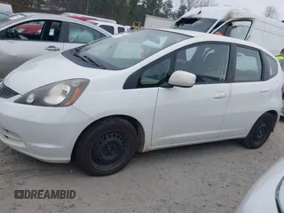 2013 Honda Fit with VIN JHMGE8H30DC067178, listed as a IAAI auction lot 41498926 with 121,036 mi miles. Bid and sale history available at carsss.com. Image 14.