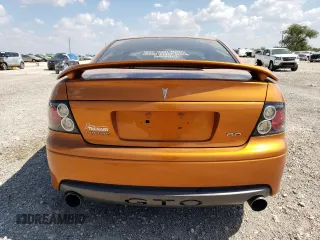 2006 Pontiac GTO with VIN 6G2VX12U76L521089, listed as a Copart auction lot 73374044 with 87,963 mi miles and Salvage Title. Bid and sale history available at carsss.com. Image 6.