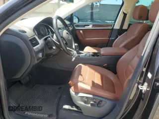 2016 Volkswagen Touareg Sport with VIN WVGEF9BP0GD007399, listed as a Copart auction lot 53990675 with 110,439 mi miles and Salvage Title. Bid and sale history available at DreamBid. Image 7.