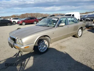 1998 Jaguar XJ with VIN SAJHX1248WC853422, listed as a Copart auction lot 80614724 with 76,269 mi miles and Non Repairable. Bid and sale history available at DreamBid. Image 1.