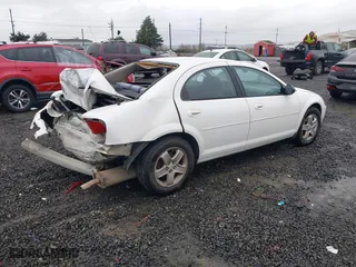 2003 Dodge Stratus SXT with VIN 1B3EL46X33N503149, listed as a IAAI auction lot 41248993 with 126,302 mi miles. Bid and sale history available at carsss.com. Image 4.