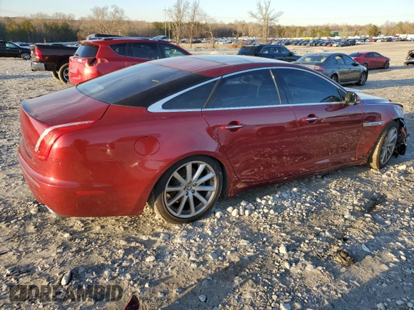 2012 Jaguar XJ with VIN SAJWA1CB3CLV37685, listed as a Copart auction lot 87586005 with 59,885 mi miles and Salvage title. Bid and sale history available at DreamBid. Image 3.
