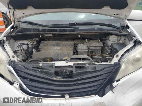 2012 Toyota Sienna LE AAS with VIN 5TDKK3DC2CS217382, listed as a Copart auction lot 58067475 with 146,769 mi miles and Salvage title. Bid and sale history available at DreamBid. Image 12.