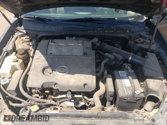 2005 Nissan Maxima SE z VIN 1N4BA41E45C805471, wystawiony jako Copart lot #58156355 z przebiegiem 184 521 mil mil oraz Szkoda całkowita • Salvage title. Historia ofert i sprzedaży dostępna na DreamBid. Obrazek 11.