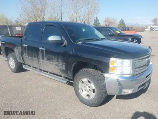 2012 Chevrolet Silverado 1500 LT with VIN 3GCPKSE72CG150430, listed as a IAAI auction lot 42004258 with 157,553 mi miles. Bid and sale history available at carsss.com. Image 1.