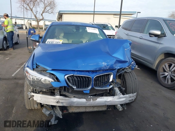 2015 BMW 2 Series 228i with VIN WBA1F5C59FVW98205, listed as a IAAI auction lot 41722804 with 91,879 mi miles. Bid and sale history available at carsss.com. Image 12.