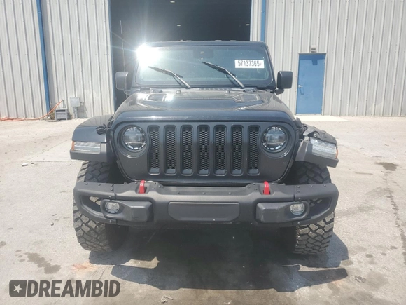 2022 Jeep Wrangler Unlimited Rubicon with VIN 1C4HJXFG1NW193437, listed as a Copart auction lot 57137365 with 56,732 mi miles and Salvage title. Bid and sale history available at DreamBid. Image 5.