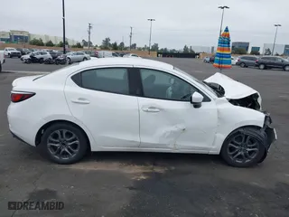 2019 Toyota Yaris Sedan L with VIN 3MYDLBYVXKY507258, listed as a IAAI auction lot 41890588 with 1 mi miles. Bid and sale history available at carsss.com. Image 12.