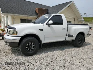 2003 Ford F-150 XL with VIN 1FTRF08W43KB36767, listed as a Copart auction lot 59747585 with 132,715 mi miles and Salvage title. Bid and sale history available at DreamBid. Image 1.