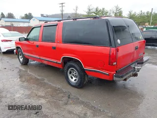 1999 Chevrolet Suburban with VIN 3GNEC16R7XG248641, listed as a IAAI auction lot 41964302 with 183,384 mi miles. Bid and sale history available at carsss.com. Image 3.