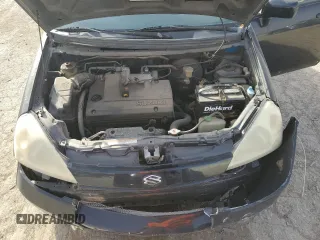 2003 Suzuki Aerio SX z VIN JS2RC41H135205642, wystawiony jako Copart lot #77690224 z przebiegiem 161 414 mil mil oraz Szkoda całkowita • Salvage title. Historia ofert i sprzedaży dostępna na DreamBid. Obrazek 12.