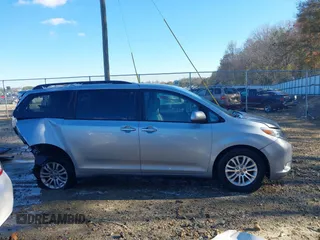 2016 Toyota Sienna XLE with VIN 5TDYK3DC3GS744752, listed as a IAAI auction lot 41077851 with 147,319 mi miles. Bid and sale history available at carsss.com. Image 14.