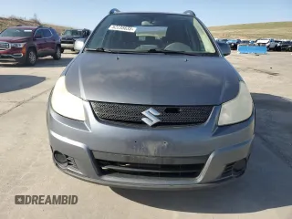 2009 Suzuki SX4 with VIN JS2YB413895101919, listed as a Copart auction lot 52235635 with 193,065 mi miles and Clean Title. Bid and sale history available at DreamBid. Image 5.