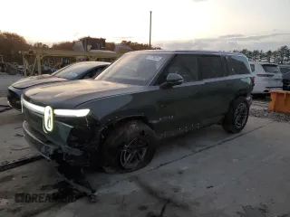 2025 Rivian R1S Adventure with VIN 7PDSGBBA1SN049423, listed as a Copart auction lot 77738224 with 0 mi miles and Salvage Title. Bid and sale history available at carsss.com. Image 1.