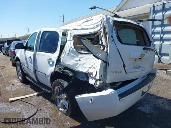 2013 Chevrolet Tahoe LTZ with VIN 1GNSKCE08DR161606, listed as a IAAI auction lot 41984912 with 189,181 mi miles and . Bid and sale history available at DreamBid. Image 3.