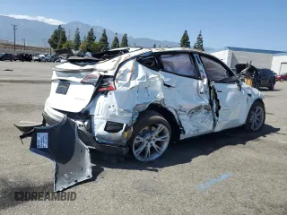 2023 Tesla Model Y Long Range z VIN 7SAYGDEE3PA077841, wystawiony jako Copart lot #54535215 z przebiegiem Nie podano mil oraz Szkoda całkowita • Salvage title. Historia ofert i sprzedaży dostępna na DreamBid. Obrazek 3.