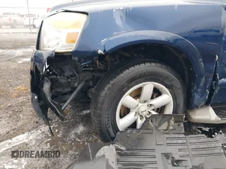 2010 Nissan Armada Titanium z VIN 5N1BA0ND2AN619989, wystawiony jako IAAI lot #41516441 z przebiegiem 161 744 mil mil oraz . Historia ofert i sprzedaży dostępna na DreamBid. Obrazek 6.