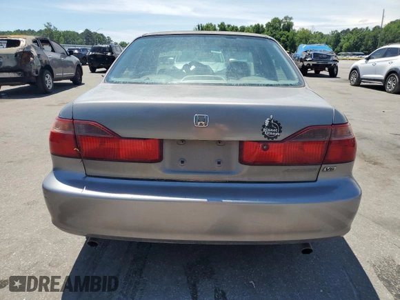 2000 Honda Accord EX с VIN 1HGCG1651YA085715, выставлен на аукционе Copart как лот 56040745 с пробегом 316 369 миль миль и Списание • Salvage title. История ставок и продаж доступна на DreamBid. Изображение 6.