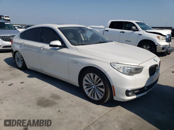 2015 BMW 5 Series 535i Gran Turismo with VIN WBA5M2C50FD872030, listed as a Copart auction lot 75757894 with 115,707 mi miles and Salvage title. Bid and sale history available at DreamBid. Image 4.