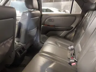 1999 Lexus RX 300 Luxury SUV with VIN JT6HF10U8X0065898, listed as a IAAI auction lot 38515585 with 113,340 mi miles. Bid and sale history available at carsss.com. Image 8.