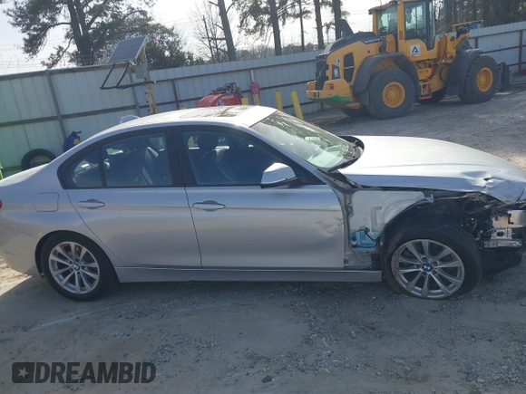 2018 BMW 3 Series 320i with VIN WBA8A9C55JAH14990, listed as a IAAI auction lot 41719896 with 77,472 mi miles. Bid and sale history available at carsss.com. Image 13.
