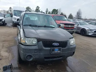 2005 Ford Escape XLS Value with VIN 1FMYU92Z35KA20497, listed as a IAAI auction lot 41509893 with 149,866 mi miles. Bid and sale history available at carsss.com. Image 12.