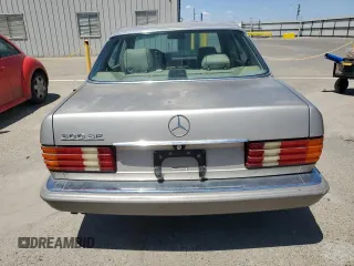 1990 Mercedes-Benz 300 with VIN WDBCA24D1LA529716, listed as a Copart auction lot 56581335 with 122,286 mi miles and Salvage Title. Bid and sale history available at DreamBid. Image 6.