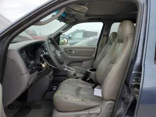 2001 Mazda Tribute LX with VIN 4F2YU09151KM49909, listed as a Copart auction lot 76792224 with Not Provided miles and Salvage Title. Bid and sale history available at carsss.com. Image 7.