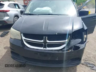 2014 Dodge Grand Caravan SXT z VIN 2C4RDGCGXER267110, wystawiony jako IAAI lot #42251423 z przebiegiem 146 198 mil mil oraz . Historia ofert i sprzedaży dostępna na DreamBid. Obrazek 6.