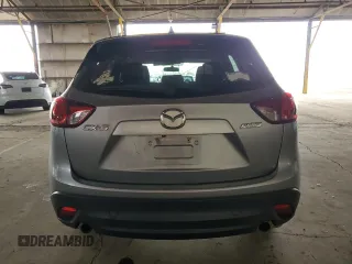 2014 Mazda CX-5 Touring z VIN JM3KE2CY7E0349484, wystawiony jako Copart lot #51188665 z przebiegiem 175 131 mil mil oraz Szkoda całkowita • Salvage title. Historia ofert i sprzedaży dostępna na DreamBid. Obrazek 6.
