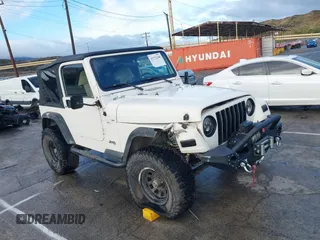 2001 Jeep Wrangler Sport with VIN 1J4FA49S41P308407, listed as a IAAI auction lot 41772240 with 139,461 mi miles. Bid and sale history available at carsss.com. Image 1.