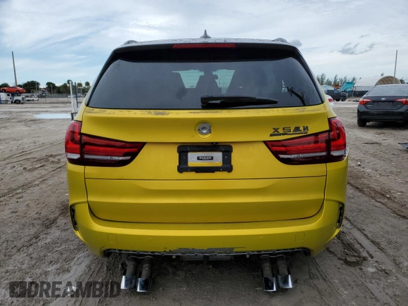 2016 BMW X5 M z VIN 5YMKT6C51G0R77692, wystawiony jako Copart lot #81979013 z przebiegiem 56 774 mil mil oraz . Historia ofert i sprzedaży dostępna na DreamBid. Obrazek 6.
