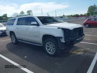 2016 GMC Yukon XL SLT z VIN 1GKS2GKC1GR239442, wystawiony jako IAAI lot #42093339 z przebiegiem 120 872 mil mil oraz . Historia ofert i sprzedaży dostępna na DreamBid. Obrazek 1.