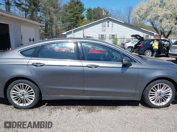 2014 Ford Fusion SE with VIN 3FA6P0H9XER319864, listed as a IAAI auction lot 42063072 with 151,526 mi miles. Bid and sale history available at carsss.com. Image 13.