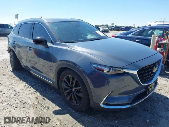 2021 Mazda CX-9 Carbon Edition with VIN JM3TCADY9M0517174, listed as a IAAI auction lot 41871485 with 48,484 mi miles and . Bid and sale history available at DreamBid. Image 1.