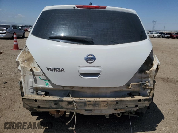 2010 Nissan Versa S z VIN 3N1BC1CP3AL369134, wystawiony jako Copart lot #54437395 z przebiegiem 236 643 mil mil oraz Szkoda całkowita • Salvage title. Historia ofert i sprzedaży dostępna na DreamBid. Obrazek 6.
