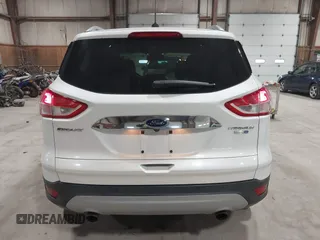 2016 Ford Escape Titanium with VIN 1FMCU9J95GUB02377, listed as a IAAI auction lot 41869557 with 88,441 mi miles. Bid and sale history available at carsss.com. Image 16.