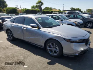 2023 Honda Accord EX-L with VIN 1HGCY2F65PA060147, listed as a Copart auction lot 57876835 with 10,995 mi miles and Salvage title. Bid and sale history available at DreamBid. Image 4.