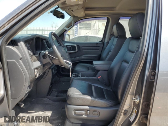 2013 Honda Ridgeline RTL with VIN 5FPYK1F51DB012680, listed as a Copart auction lot 50987085 with 63,372 mi miles and Salvage Title. Bid and sale history available at carsss.com. Image 7.
