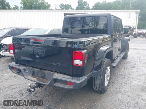 2023 Jeep Gladiator Sport S z VIN 1C6HJTAG3PL521954, wystawiony jako IAAI lot #42502126 z przebiegiem 49 606 mil mil oraz . Historia ofert i sprzedaży dostępna na DreamBid. Obrazek 4.